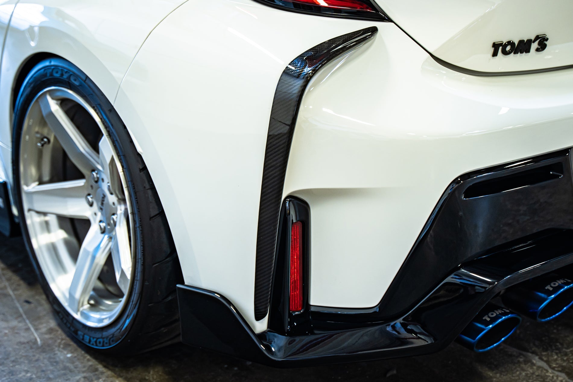TOM'S Racing - Carbon Fiber Rear Bumper Garnish - Toyota GR Corolla [2023+] ** ETA END OF JULY ** - 0